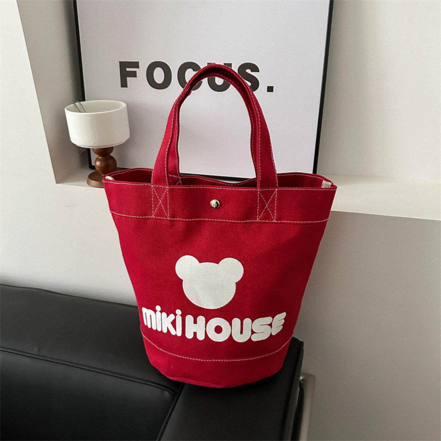 日系帆布卡通手提水桶包