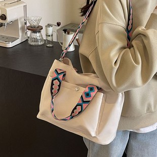 帆布手提包包女2024新款休闲轻便大容量通勤包时尚宽带单肩斜挎包