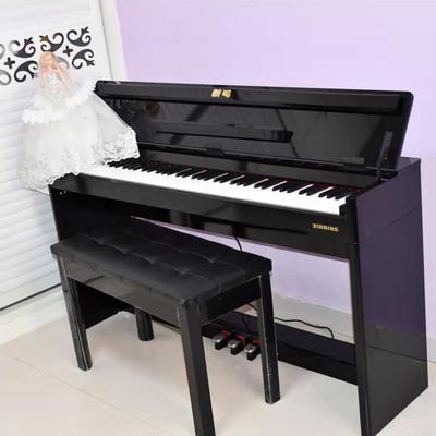 泉州九利桌莱电钢琴88重键锤家成LOS人初用学儿童幼师书款电钢琴