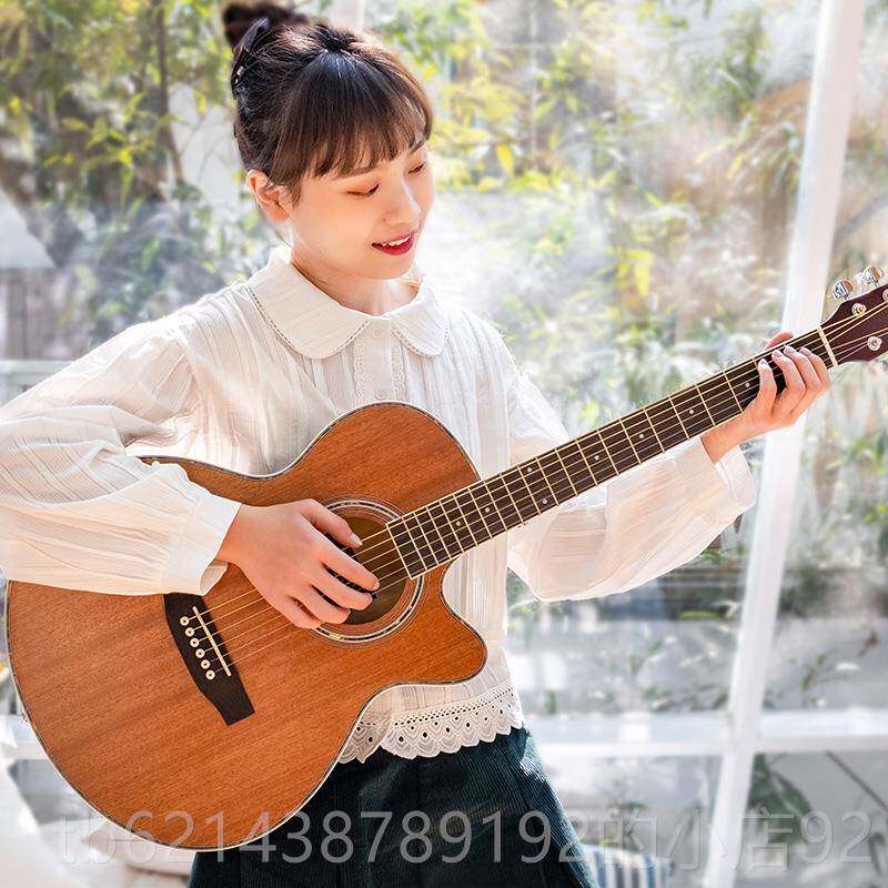 高档04单板初学者民谣吉他女学生男生入门网红4寸1新练习手木吉它
