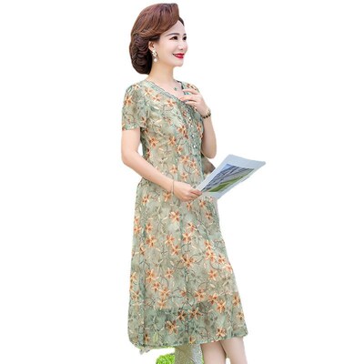 Fashionable age-reducing figure-flattering m dress. Spring a