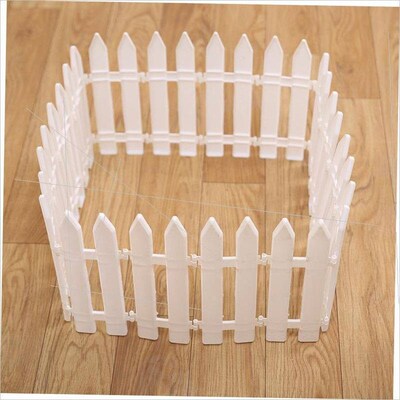 Christmas tree fence decorated with removable plastic fence