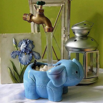 Magic Flowing Spout Watering Can Fountain Floating Tap Water