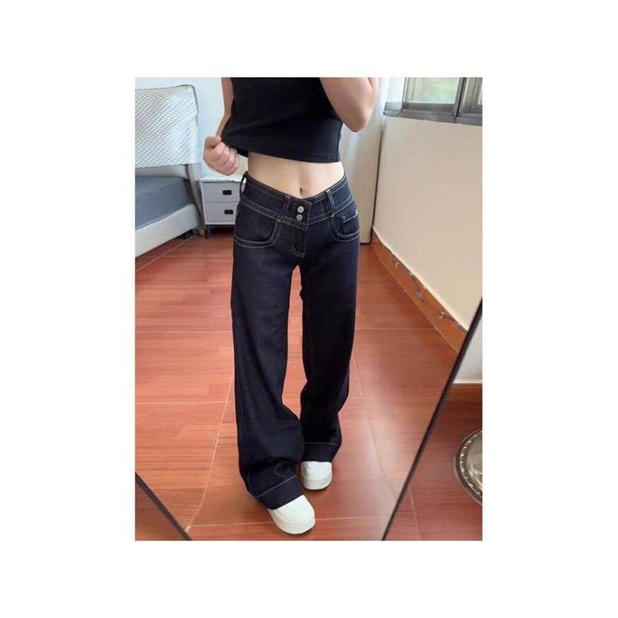 深蓝色不贴腿微喇牛仔裤