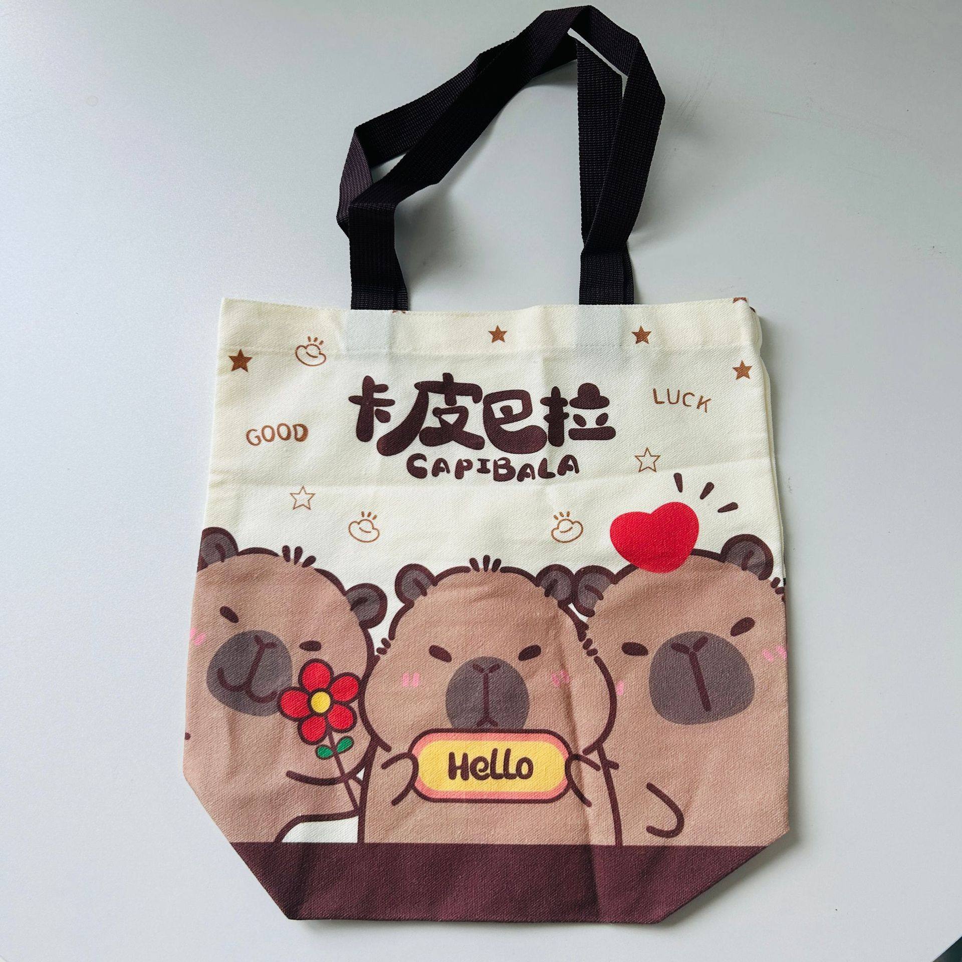 韩系卡通蝴蝶结手提包日系极简帆布包单肩上课通勤便当包,箱包皮具/热销女包/男包,时尚帆布包,淘宝优惠券,粉丝福利购,淘宝优惠卷