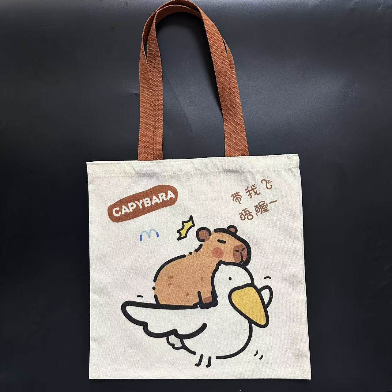 时尚百搭日常休闲风帆布包高级感大容量单肩包韩版简约卡通包包,箱包皮具/热销女包/男包,时尚帆布包,淘宝优惠券,粉丝福利购,淘宝优惠卷