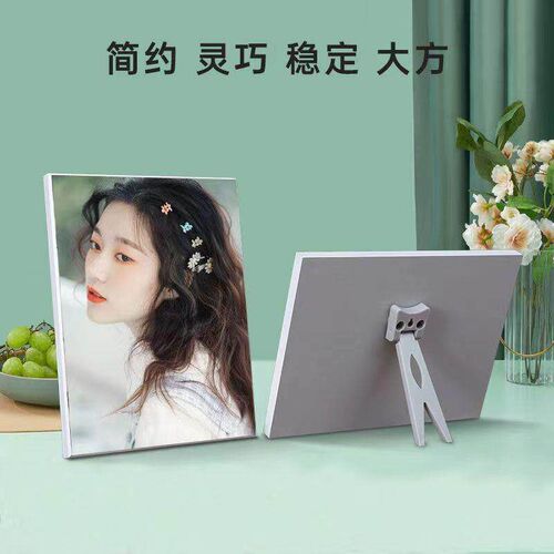 Swing table photo frame bracket behind the shelf bracket