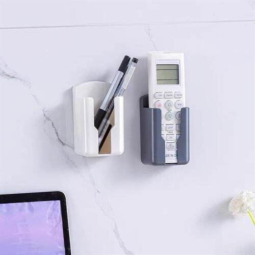 Wall-mounted storage box for home air conditioner remote con