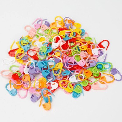 Colorful hand-woven tool accessories: plastic markers, sewin
