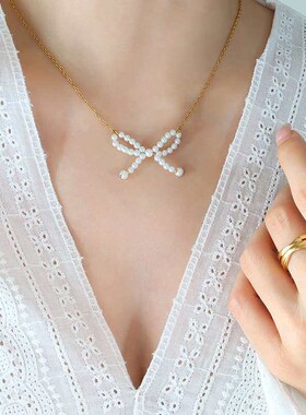 French Style Ins imitatoon Pearl Bow Pendant Titanium Steel
