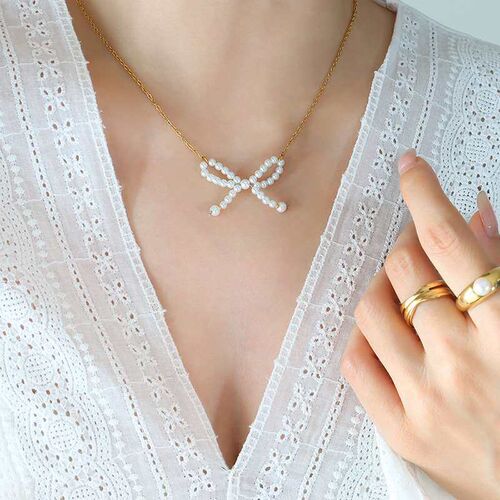 French Style Ins imitatoon Pearl Bow Pendant Titanium Steel