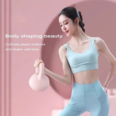 Soft kettlebells, women carrying kettlebells, deep squat str
