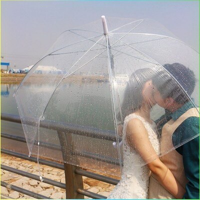 Folded white couple transparent umbrella plastic sun umbrell