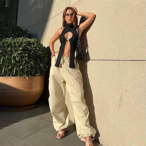Womens knitted hollow sleeveless top for slimming effect