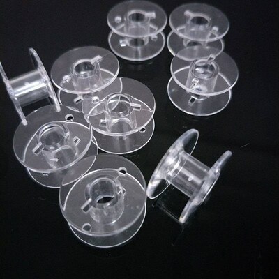 Hot sell 10pcs Clear Plastic Empty Bobbins For Brother Janom