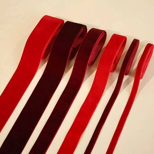 1 roll of wine Red Velvet ribbon used as Christmas tree mate