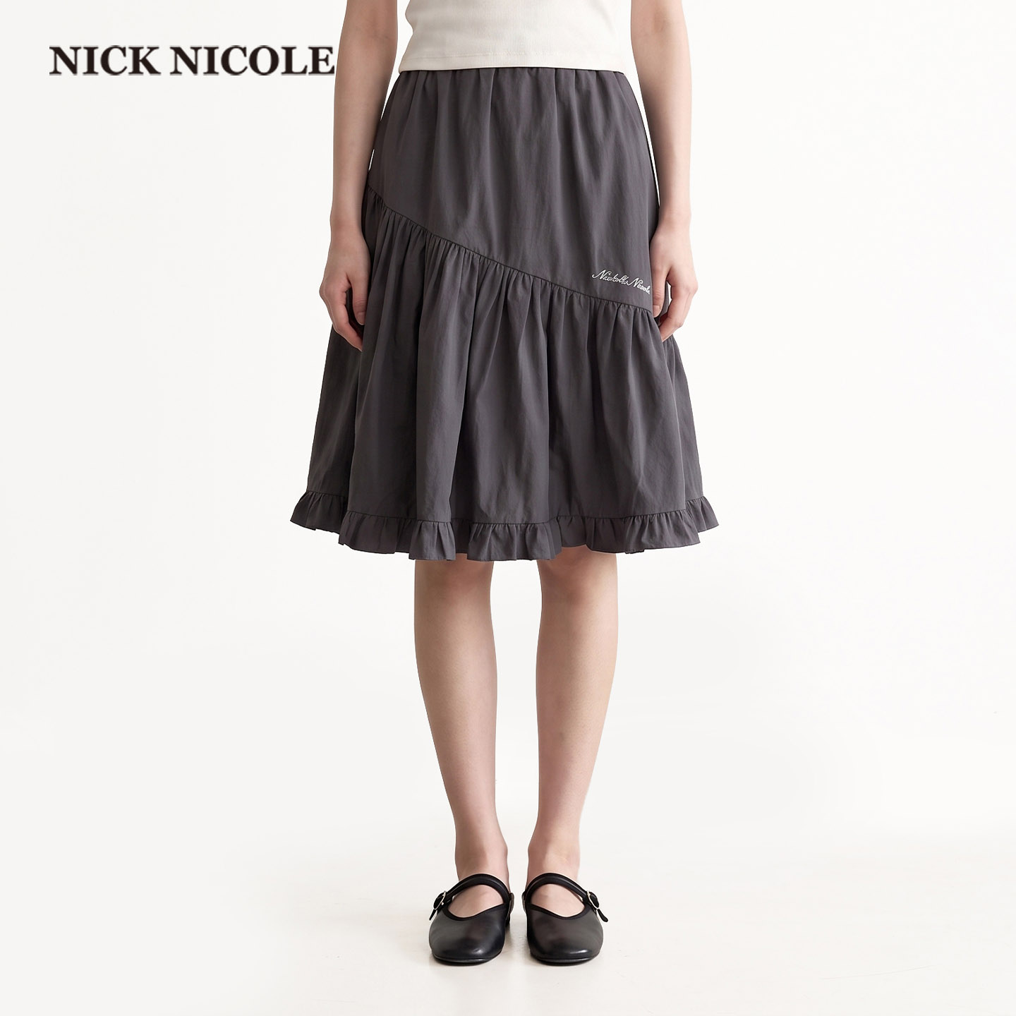 NICK&NICOLE2026夏季不规则荷叶边半身裙法式大摆蛋糕裙显瘦气质