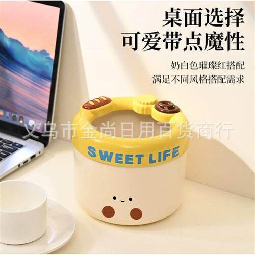 Cute and mini cream-colored desktop storage bucket with a li