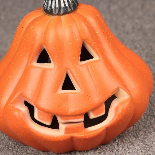 Halloween pumpkin lantern decoration with glowing pumpkin