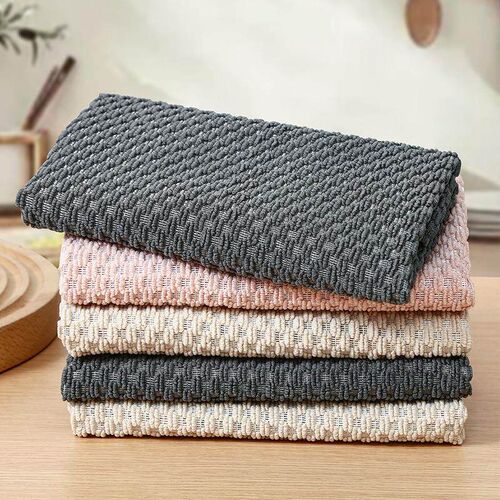 Corn kernel scrubbing cloth, which is absorbent and does not