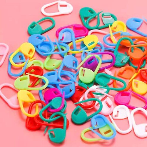 Colorful hand-woven tool accessories: plastic markers, sewin