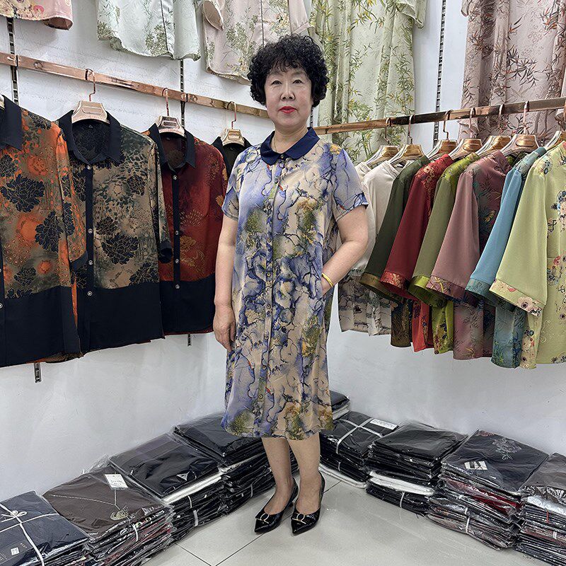 四十岁女人夏款POLO领文艺洋气连衣裙女中长款50岁妈妈单排扣母亲
