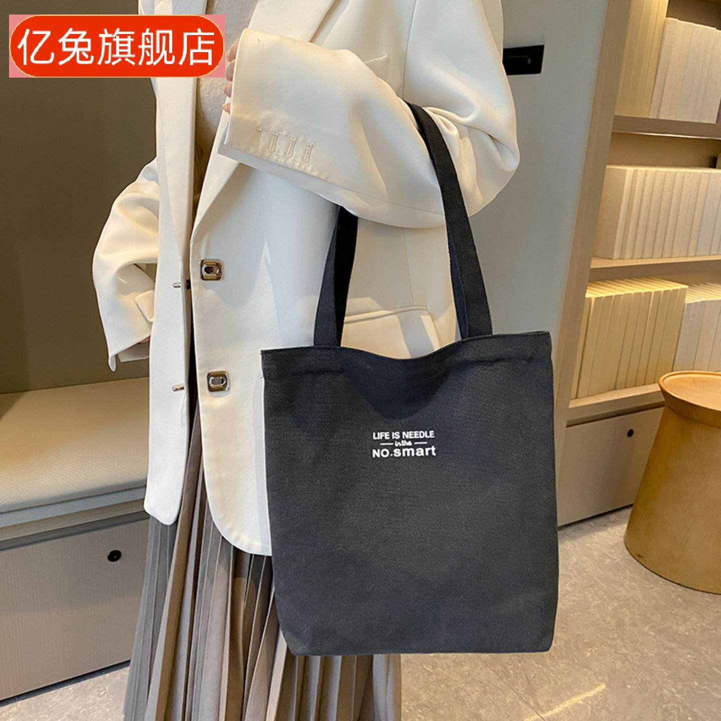 帆布包女文创国潮竖款斜挎包男生小背包单肩包学生风小包包