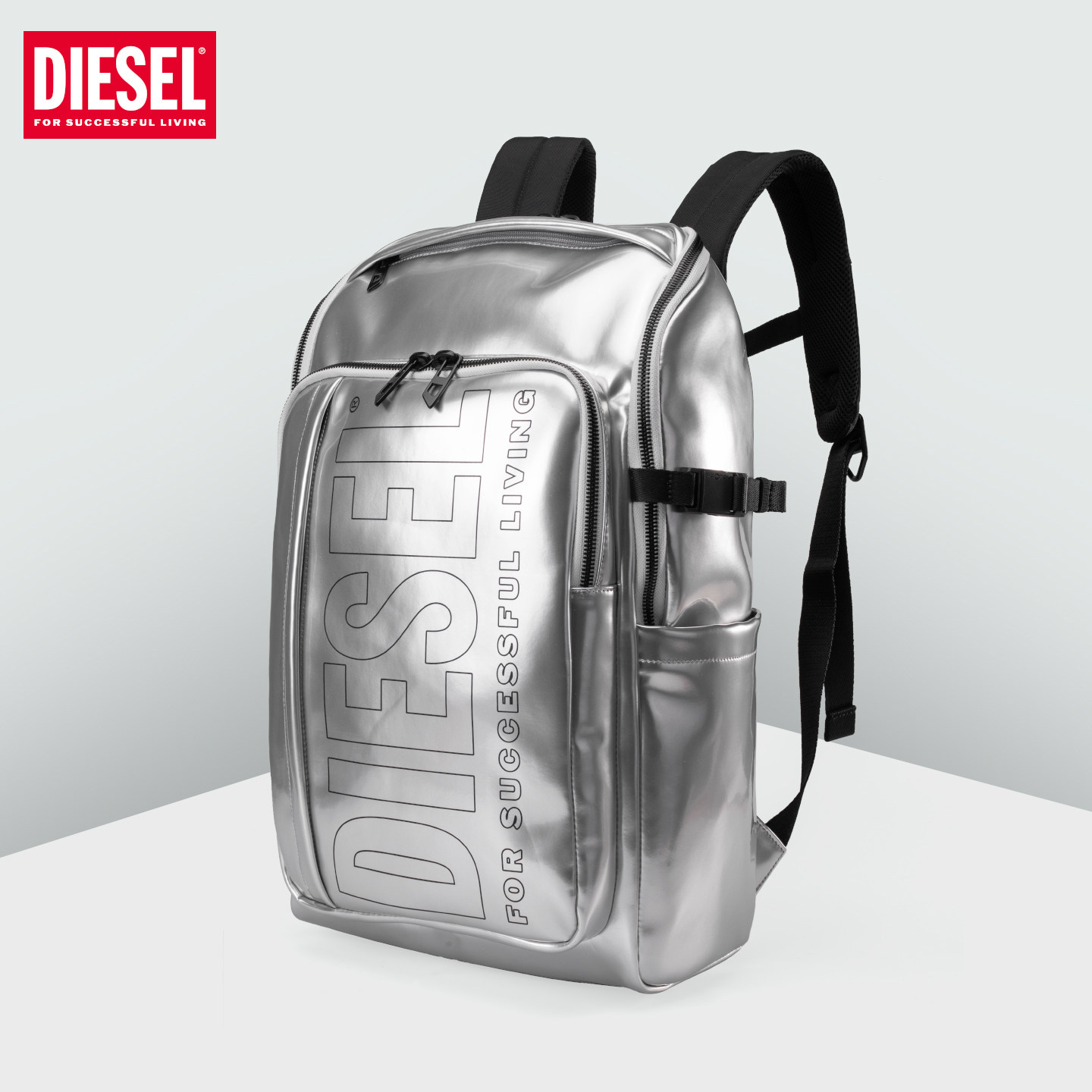 DIESEL亮面大容量斜跨双肩背包图片