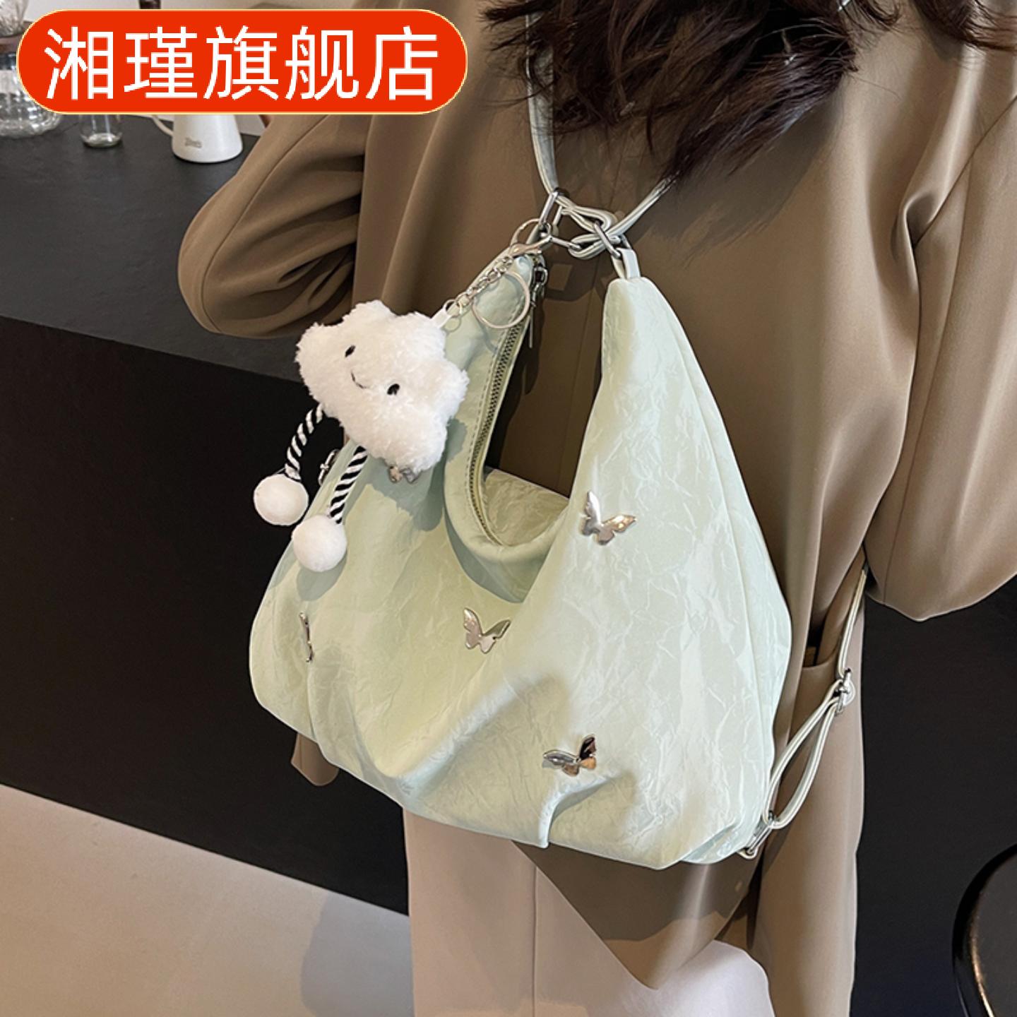 大容量春夏新款通勤双肩水桶女