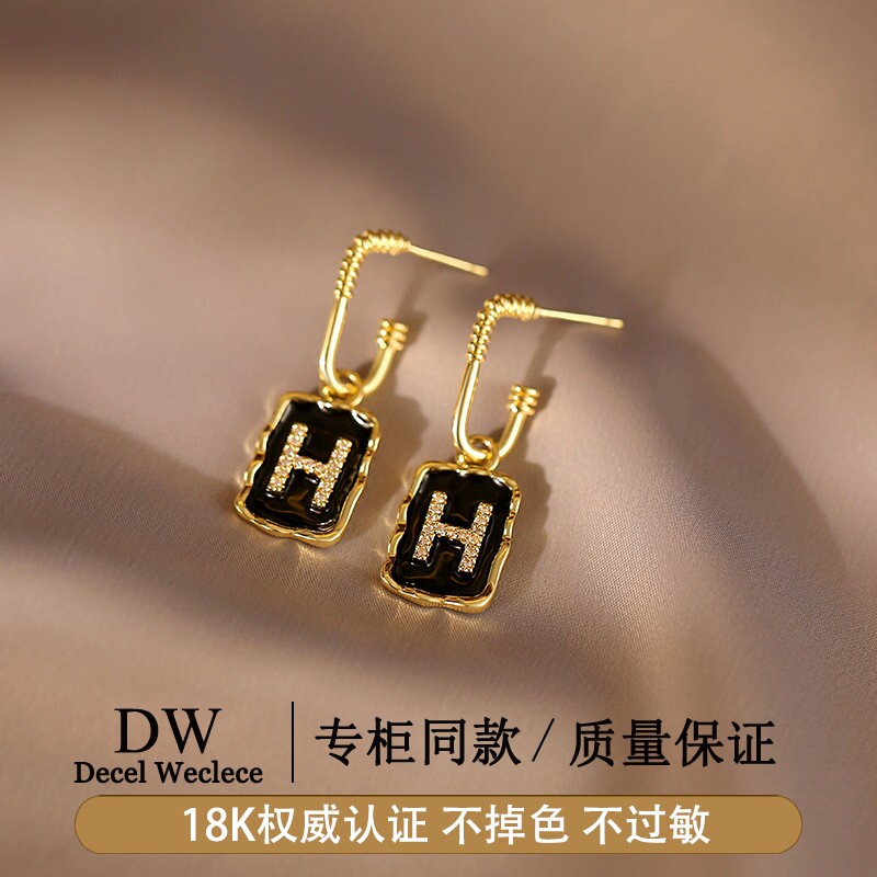 奥特莱斯【品牌撤柜1折】18K金巴黎Delia Chan几何字母耳环女耳
