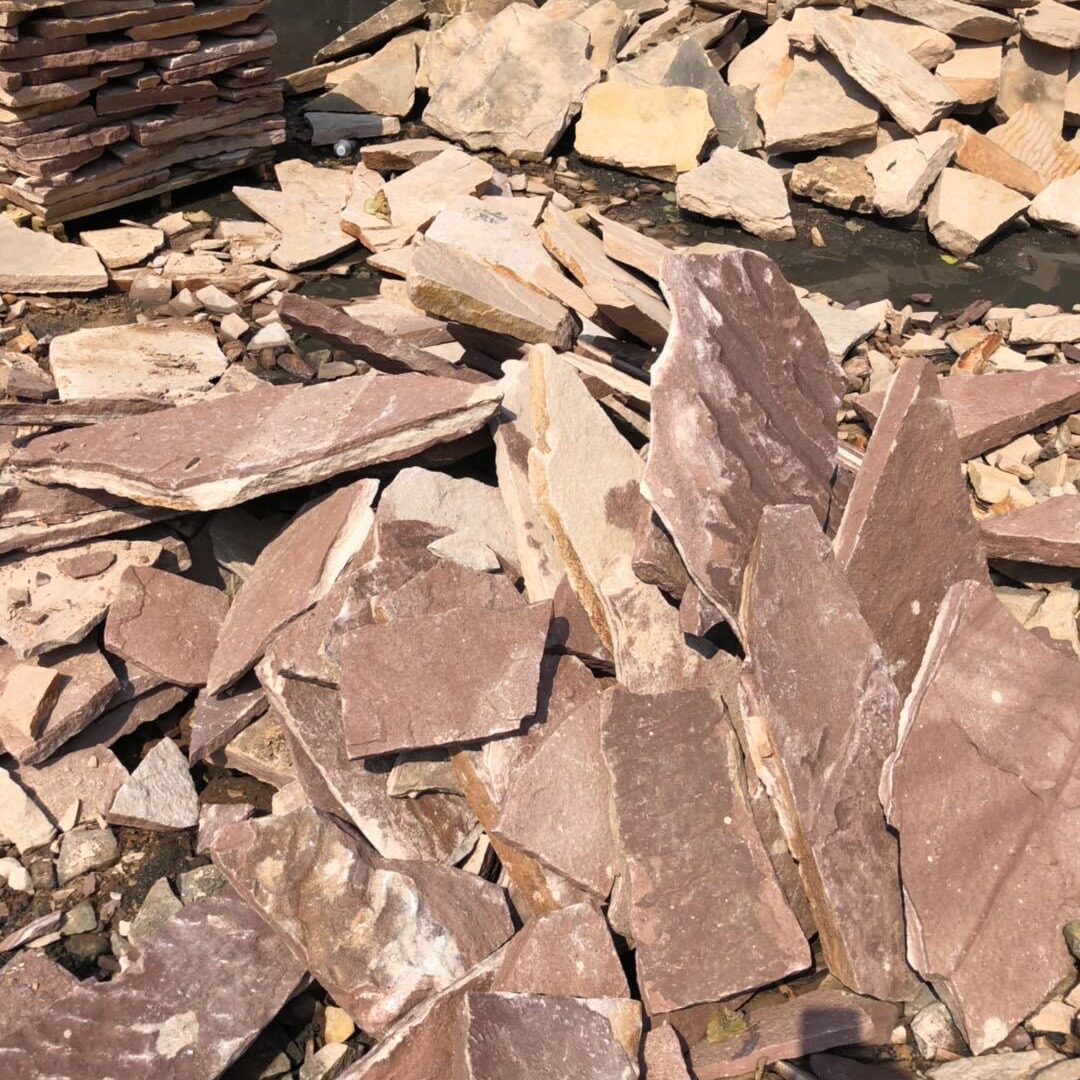 砌墙石建筑石材乱形石广场铺路用乱片石草坪踏步石高粱红乱型石
