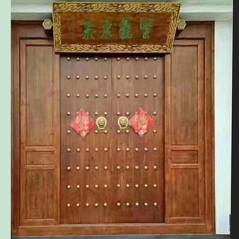 仿古木门厂家直销原木雕刻中式仿古实木大门原木双开入户门