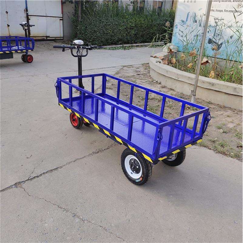 蓝色万向轮护栏小车 电动平板搬运车 四轮电动拉货车多用途