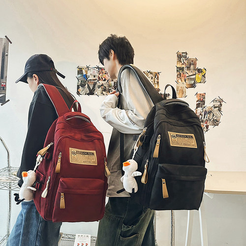 简约大容量双肩包男女通用初高中大学生书包结实耐用电脑行李背包