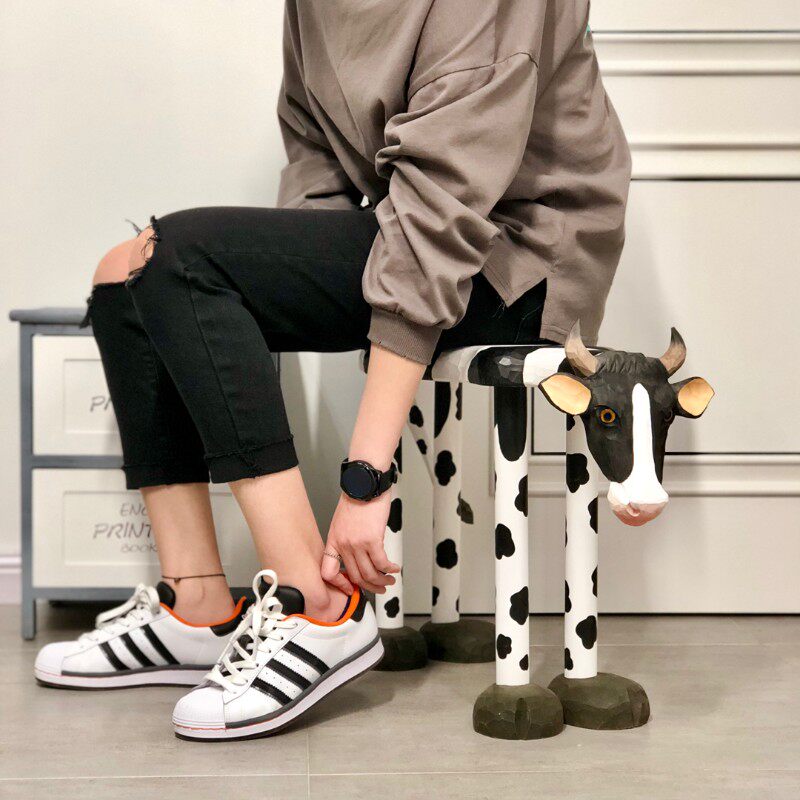 实木手工雕刻北欧动物奶牛换鞋凳家用门口创意进门矮凳玄关穿鞋凳