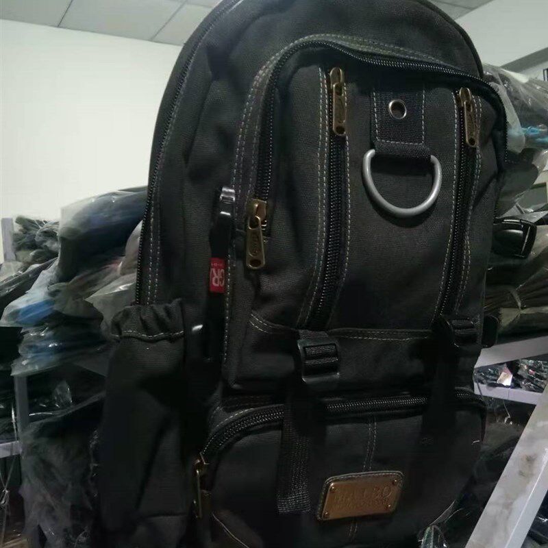 帆布多兜双肩包背包大容量男士旅游包行李包中小学生帆布书包促销
