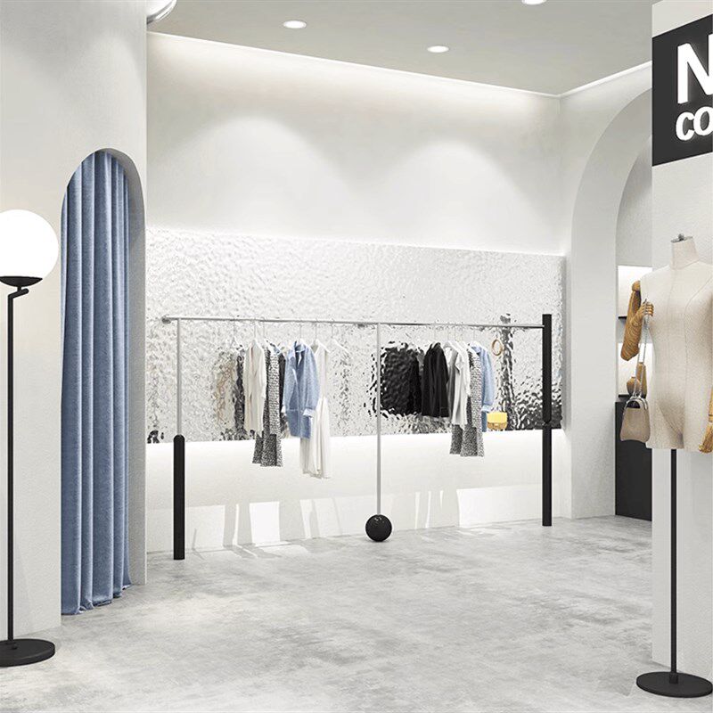 服装店展示架不锈钢黑色上墙挂衣架专用衣服道具陈列架女装店货架