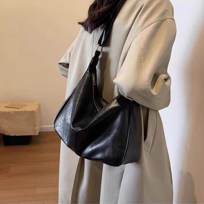 复古软皮托特包女2026新款小众设计通勤百搭单肩斜挎包黑色大包女