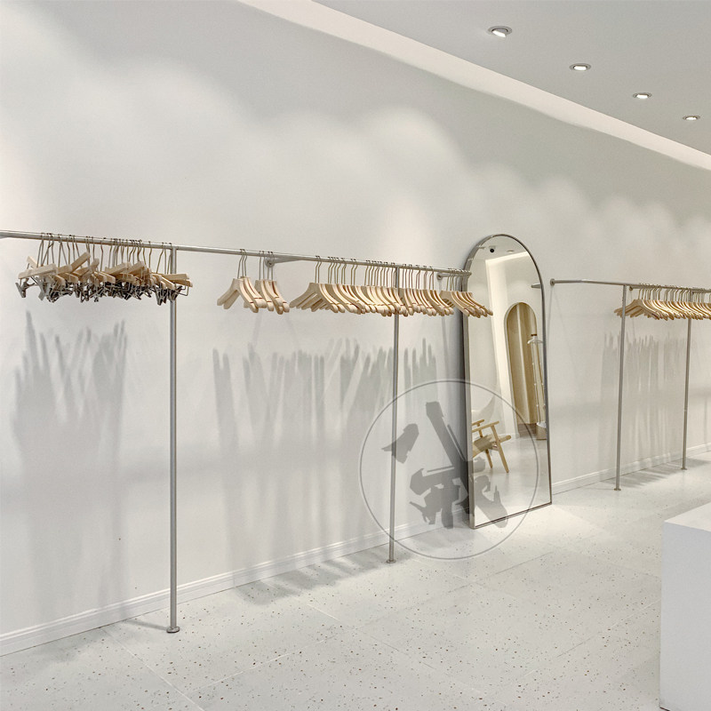 服装店衣架展示架上墙壁挂式挂衣杆童装装修设计效果图女装店货架