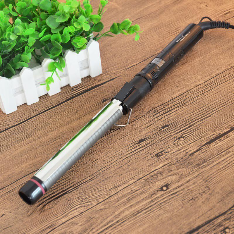 千艺液晶显示旋转电卷棒造型棒梨花头卷发器卷发棒钛金不伤发2010