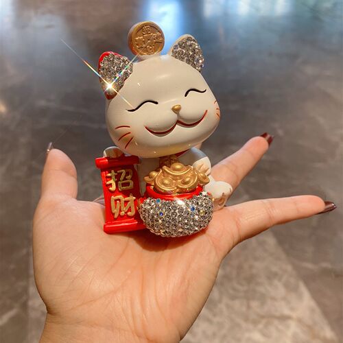创意摇头钱袋公仔汽车中控台摆件高颜值镶钻招财猫车内个性装饰品