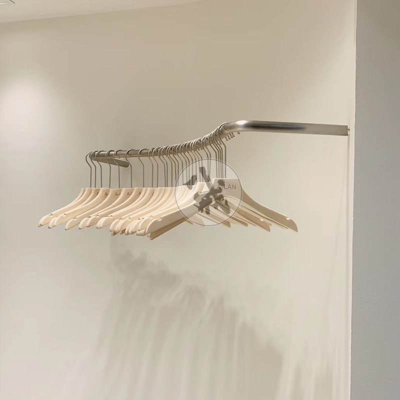 服装店衣架展示架上墙壁挂式挂衣杆童装装修设计效果图女装店货架
