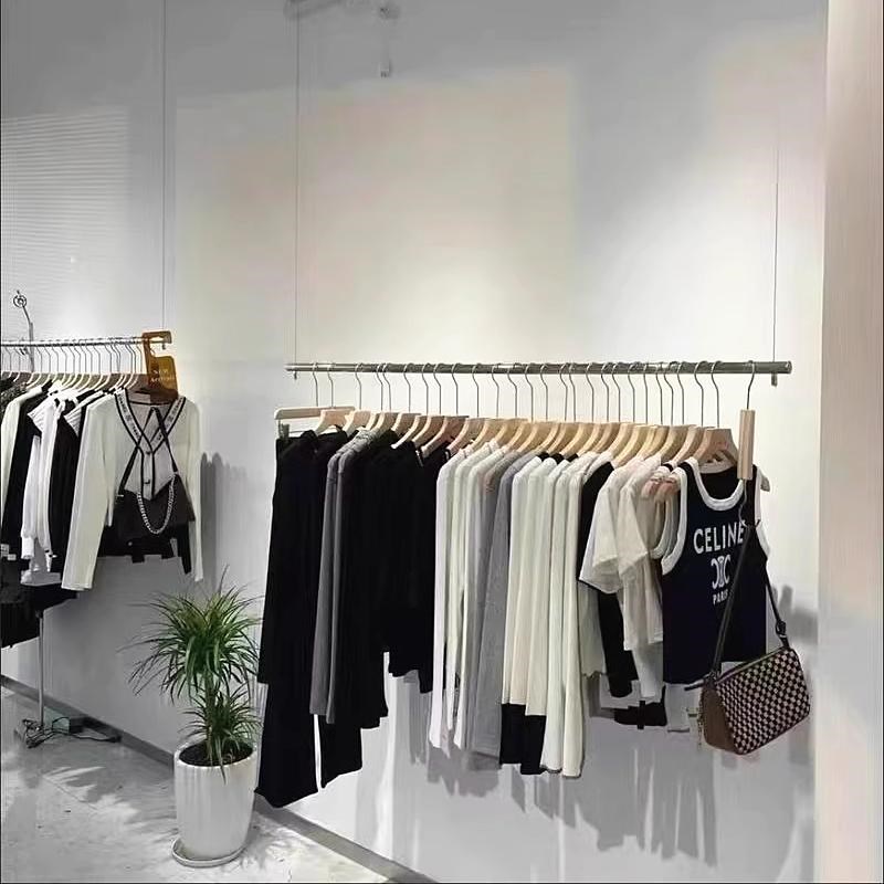 服装店不锈钢吊架吊顶悬挂展示架侧挂简约女装挂衣杆橱窗陈列货架图片
