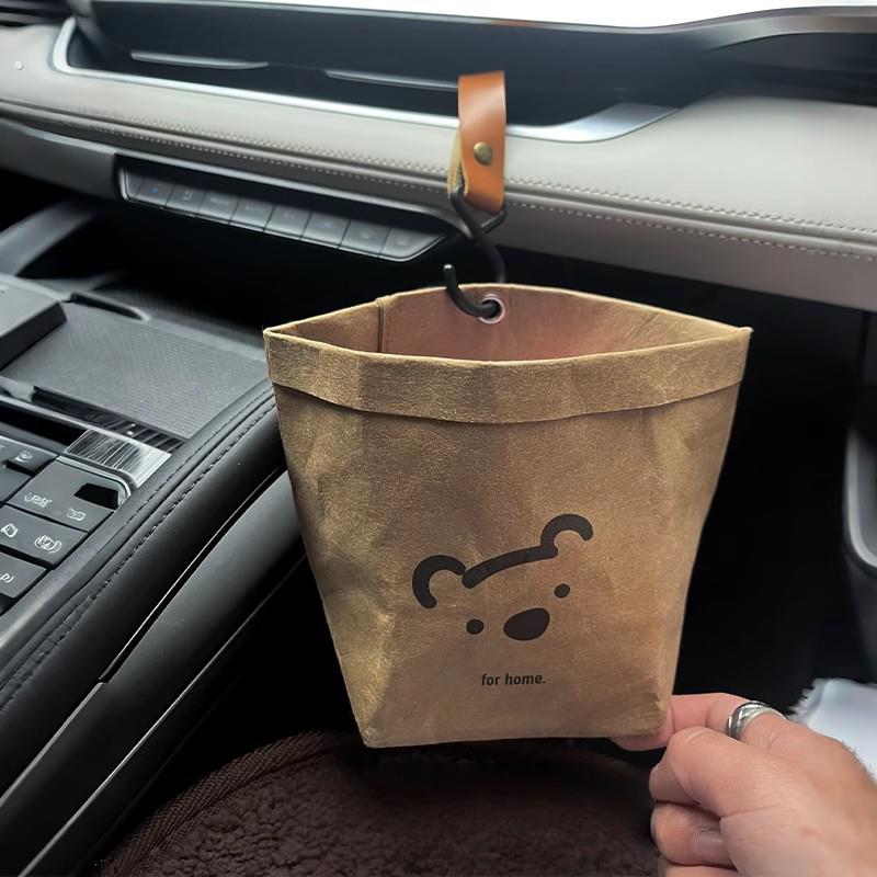 创意车载垃圾桶汽车内用品收纳袋挂式可水洗牛皮纸垃圾袋置物桶男