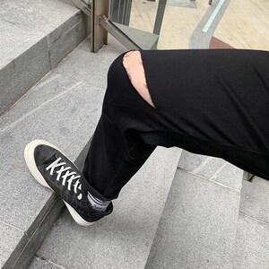 7号仓库 昱本期盼已久终于出黑色的了一字开口破洞活力九分牛仔裤