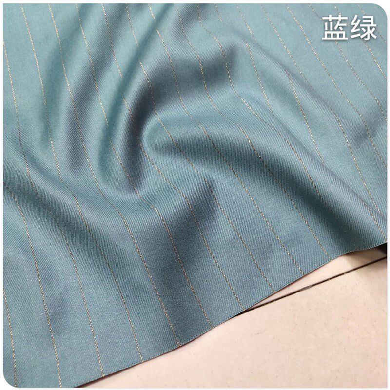 2020秋季新款高支斜纹织亮丝条纹布料职业西装套装一步裙服装面料