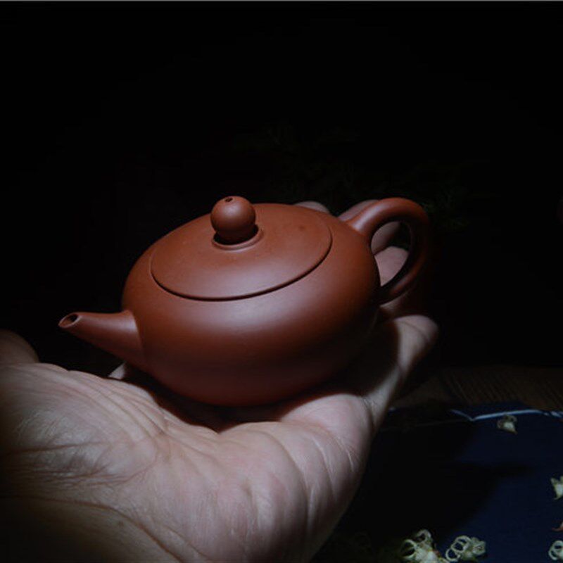 潮州章氏朱泥手拉壶潮汕工夫小茶壶无釉紫砂壶迷你7孔出水西施壶