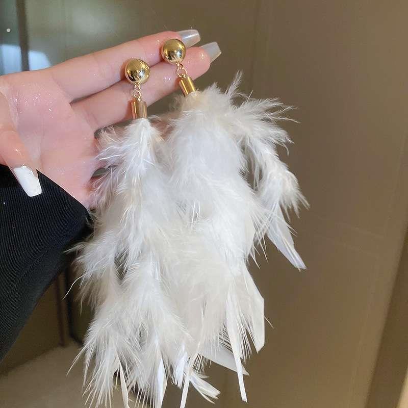 超仙流苏蚊香盘耳夹覆古民族波西长款耳环出游拍照耳坠羽毛耳饰