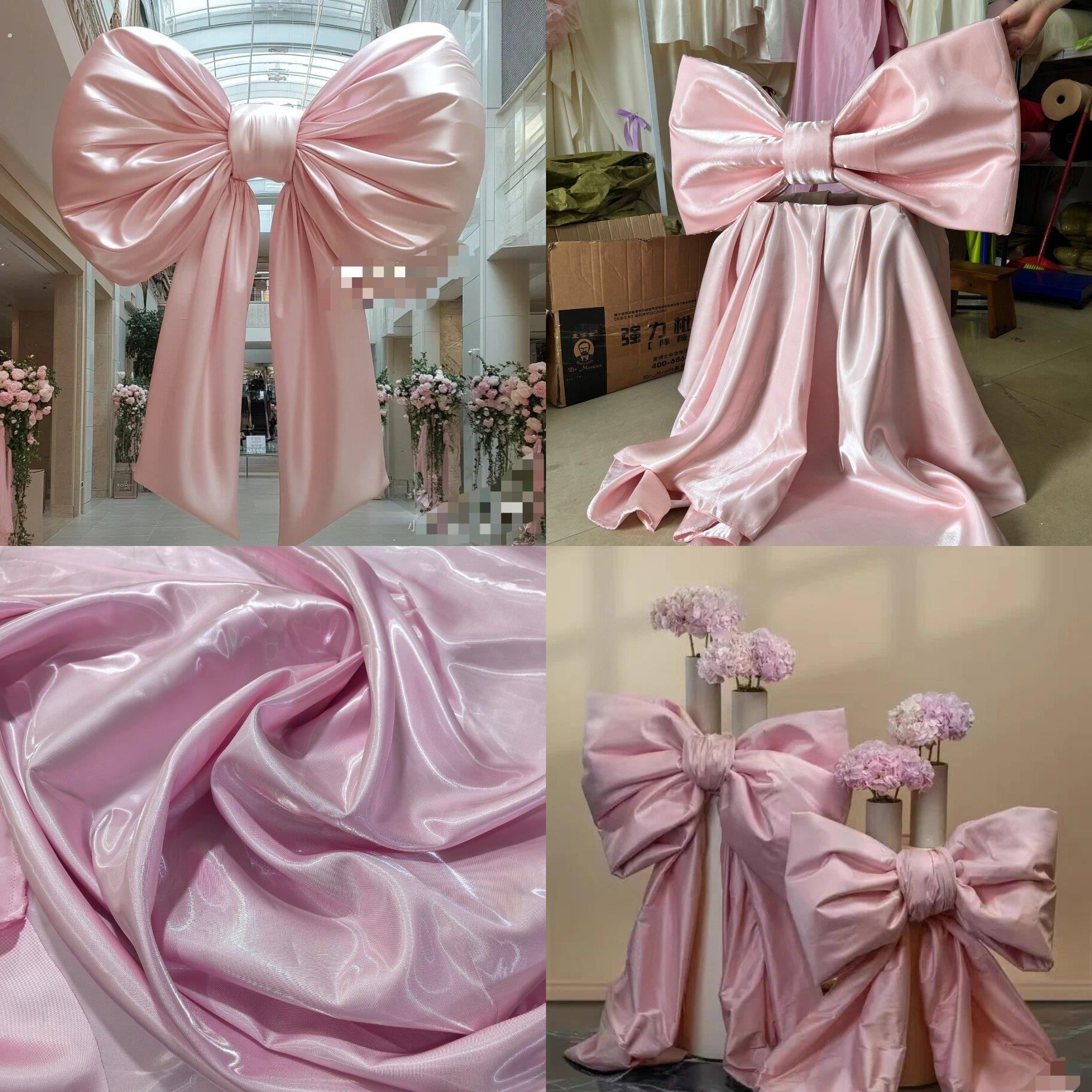 粉色蝴蝶结婚庆缎面反光布料礼服水光缎液态硬挺绸缎婚礼场景布置