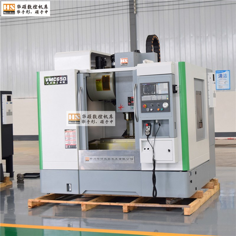 供应圆盘刀臂刀库立式加工中D心650规格立式加工中心